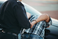 police-officer-arrests-driver-violator-road 266732-6771